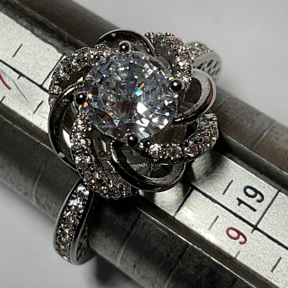 Sterling Silver Ring with clear stones. Size 8 - Picture 1 of 7